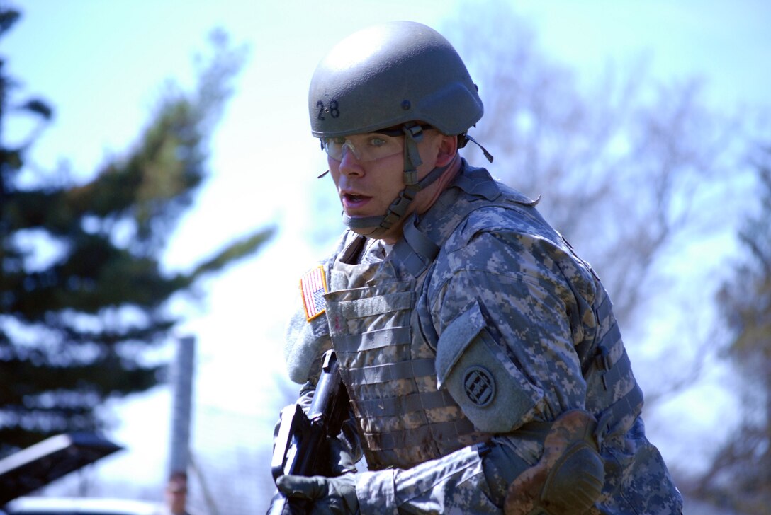 Sgt. Benjamin Poulin, from the 3rd Transportation Brigade (Expeditionary), competes at the Medical Simulation Training Center (MSTC) during the 377th Theater Sustainment Command Best Warrior Competition held at Joint Base McGuire-Dix-Lakehurst, NJ from April 10-14, 2017. Cadre evaluated competitors as they made their way through a series of obstacles as quickly as possible to help a simulated casualty. Winners from the 377th TSC will vie for the U.S. Army Reserve Best Warrior title at Fort Bragg, N.C., June 11-17. (U.S. Army photo by Staff Sgt. David Clemenko)