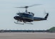 An UH-1N Iroquois lands at Joint Base Andrews, Md., April 13, 2017. The helicopters belong to the 1st Helicopter Squadron, which performed a medical evacuation of a downed pilot during the F-16 Fighting Falcon crash incident April 5. (U.S. Air Force photo by Senior Airman Jordyn Fetter)