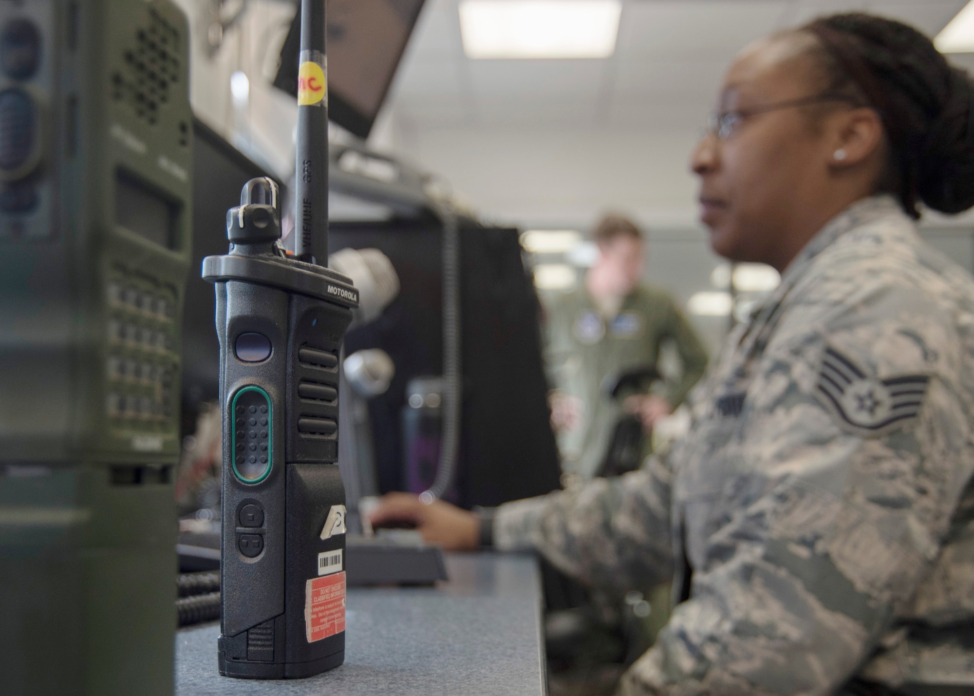 Staff Sgt. Chantal Campbell, 1st Helicopter Squadron mission controller, views information about helicopter flights at Joint Base Andrews, Md., April 13, 2017. Mission controllers are responsible for communicating with flight crews and relaying essential information to them. During the F-16 Fighting Falcon crash incident April 5, they directed two UH-1N Iroquois to the scene to medically evacuate the downed pilot. (U.S. Air Force photo by Senior Airman Jordyn Fetter)