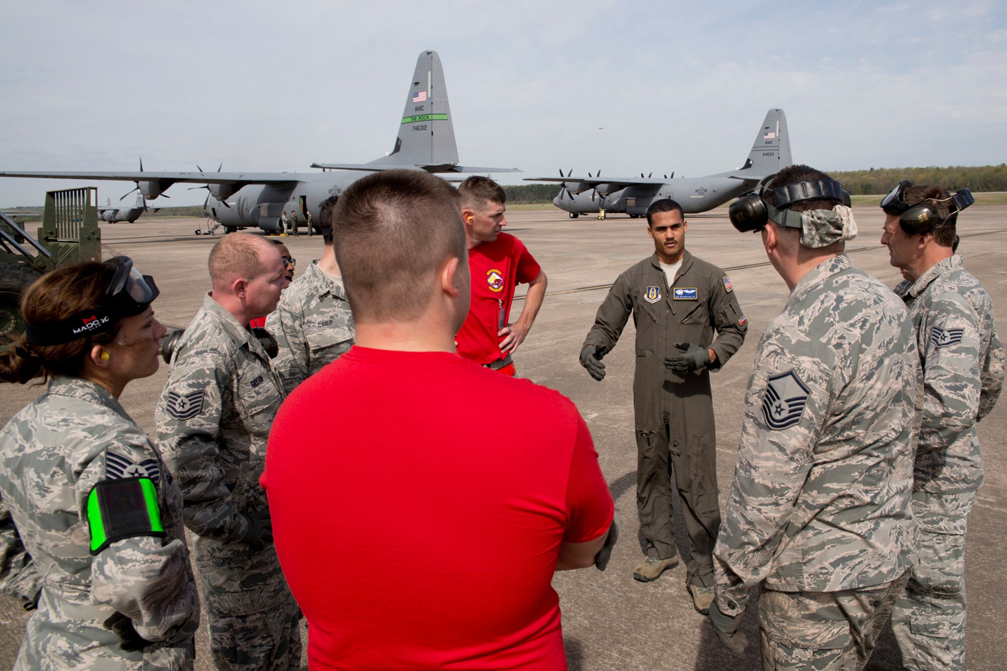 U.S. Air Force Reserve Senior Airman Anthony Miller, loadmaster, 327th Airlift Squadron, critiques the performance of an air transportation team during a training exercise April 2, 2017, at Little Rock Air Force Base, Ark. A team from the 96th Aerial Port Squadron is training to compete in the 2017 Port Dawg Challenge for air mobility professionals, at Dobbins Air Reserve Base, Ga. (U.S. Air Force photo by Master Sgt. Jeff Walston/Released)