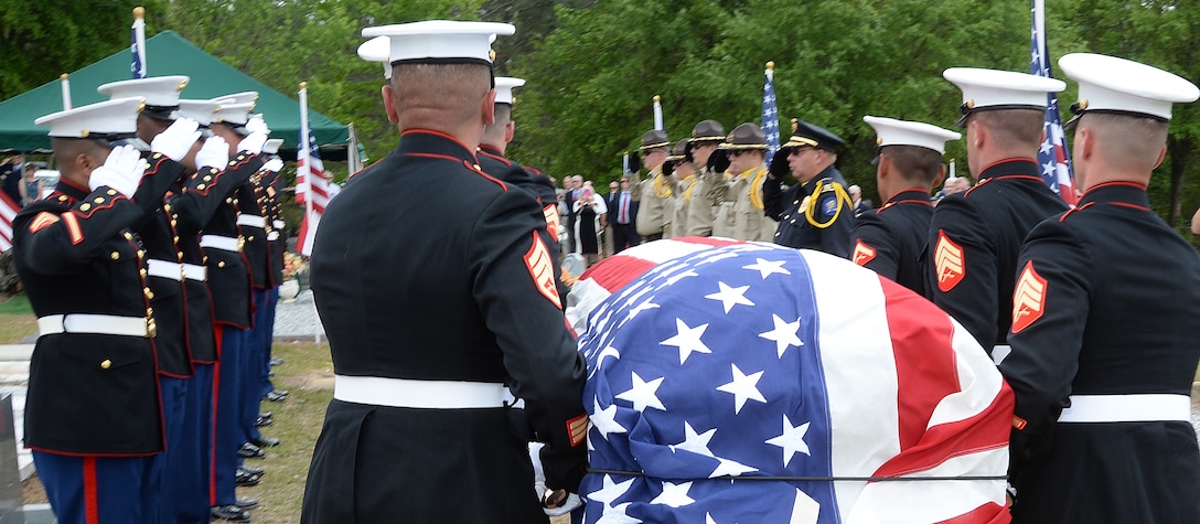 Marines attached to Marine Corps Logistics Base Albany funeral detail carry Marine Pfc. James O. Whitehurst to his final resting place at Cowarts Baptist Church Cemetery in Cowarts, Ala., April 12. Whitehurst was killed in action while fighting the Japanese at the battle of Tarawa during World War II, Nov. 20, 1943.