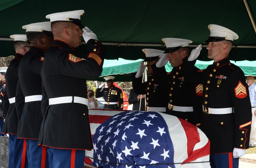 Marines attached to Marine Corps Logistics Base Albany funeral detail render a salute as they laid to rest Marine Pfc. James O. Whitehurst at Cowarts Baptist Church Cemetery in Cowarts, Ala., April 12. Whitehurst was killed in action while fighting the Japanese at the battle of Tarawa during World War II, Nov. 20, 1943.