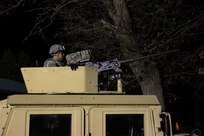 A U.S. Army Reserve Soldier with 325th Psychological Operations Company (Airborne), U.S. Army Civil Affairs and Psychological Operation Command, prepares for basic night live-fire during Operation Cold Steel at Fort McCoy, Wis., April 11, 2017. Operation Cold Steel is the U.S. Army Reserve's crew-served weapons qualification and validation exercise to ensure that America's Army Reserve units and Soldiers are trained and ready to deploy on short-notice and bring combat-ready and lethal firepower in support of the Army and our joint partners anywhere in the world. (U.S. Army Reserve photo by Staff Sgt. Debralee Best, 84th Training Command)