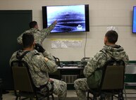 U.S. Army Reserve Soldiers with 325th Psychological Operations Company (Airborne), U.S. Army Civil Affairs and Psychological Operation Command, identify targets on a thermal image during Operation Cold Steel at Fort McCoy, Wis., April 11, 2017. Operation Cold Steel is the U.S. Army Reserve's crew-served weapons qualification and validation exercise to ensure that America's Army Reserve units and Soldiers are trained and ready to deploy on short-notice and bring combat-ready and lethal firepower in support of the Army and our joint partners anywhere in the world. (U.S. Army Reserve photo by Staff Sgt. Debralee Best, 84th Training Command)