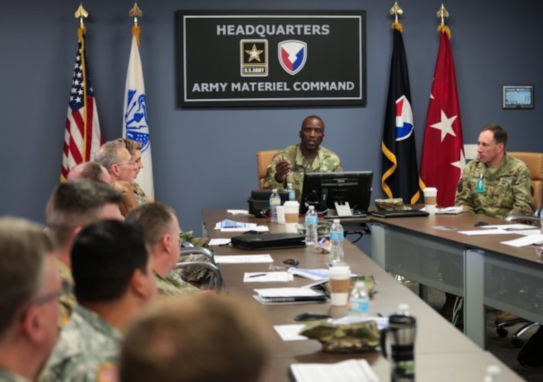 Chief Warrant Officer 5 Darren Cook leads the discussion among Reserve warrant officers from the Army Materiel Command's Army Reserve Element during a professional development meeting April 5 at AMC headquarters. Topics included promotion timelines, professional military education and considerations of civilian employers. The professional development meeting is the first such meeting held by the element at AMC headquarters at Redstone Arsenal, AL.  

(U.S. Army photo by: Sgt. Eben Boothby)