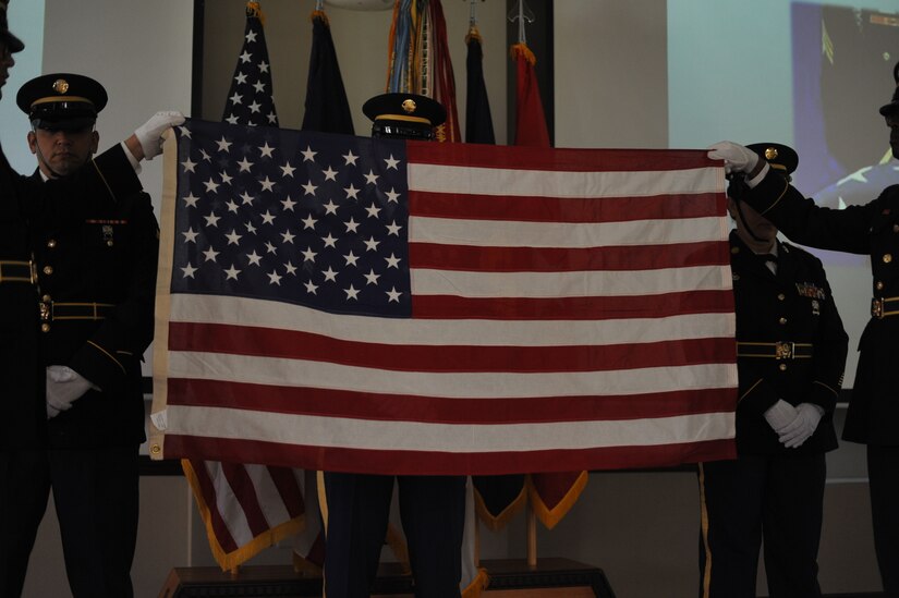 Members of the 1st Mission Support Command Honor Guard present the colors during the start of the retirement ceremony held at Fort Buchanan, Puerto Rico, April 8.