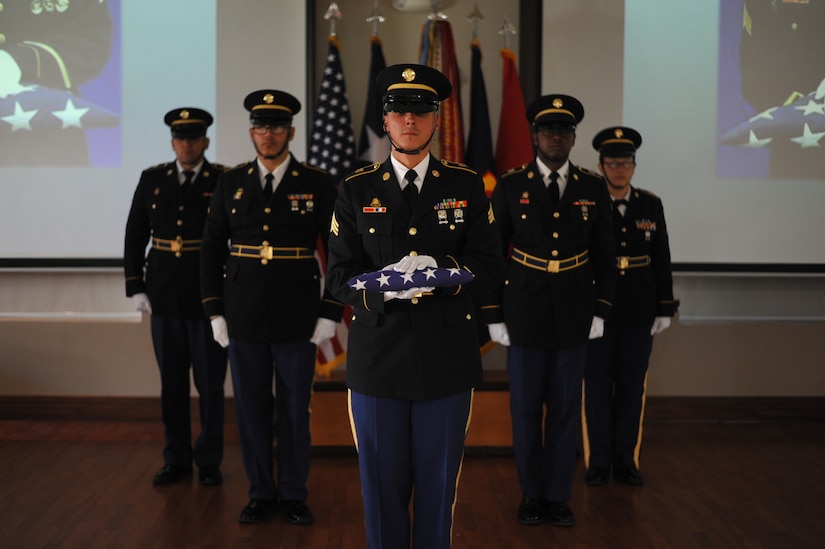 Members of the 1st Mission Support Command Honor Guard present the colors during the start of the retirement ceremony held at Fort Buchanan, Puerto Rico, April 8.