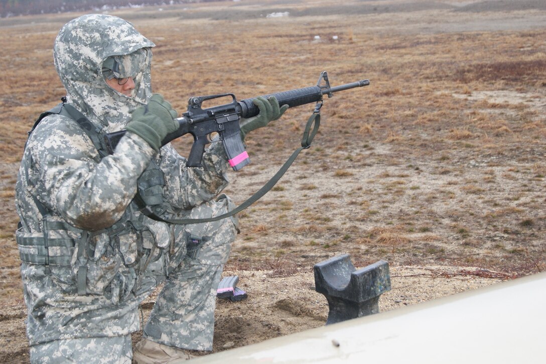 Competitor Staff Sgt. Raymond Velez, Jr., of the 94th Training Division, chambers a round in his M16-A2 rifle at the weapons qualification range at Fort Devens, Massachusetts, April 4, 2017, as part of the 2017 Joint 80th Training Command and 99th Regional Support Command Best Warrior Competition.