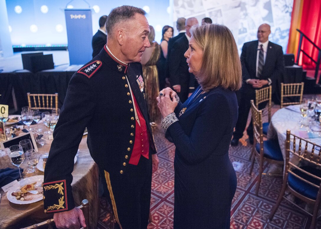 Marine Corps Gen. Joe Dunford, chairman of the Joint Chiefs of Staff, speaks with Bonnie Carroll, TAPS president and founder during the Tragedy Assistance Program for Survivors 2017 Honor Guard Gala in Washington, D.C., April 12, 2017. DoD photo by Navy Petty Officer 2nd Class Dominique Pineiro