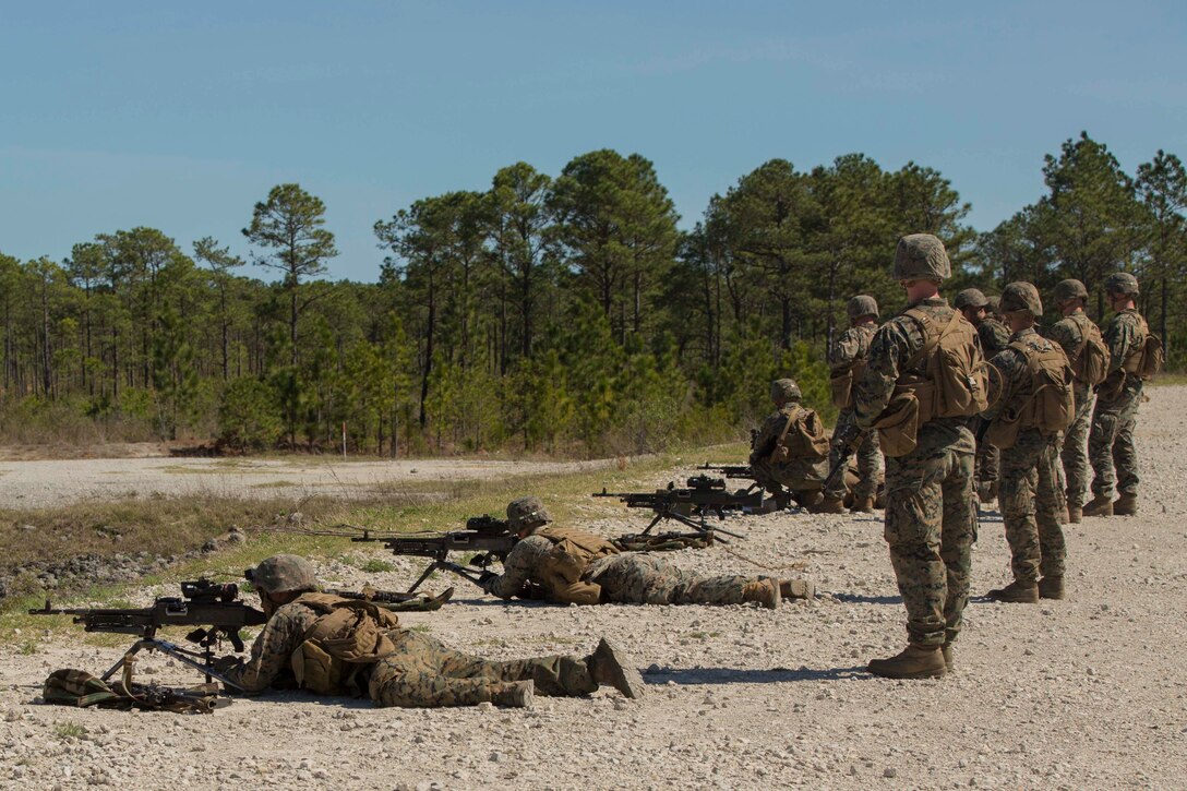 Machine gunners prepare to fire their M240B medium machineguns during a live-fire range at Camp Lejeune, N.C., April 11, 2017. Marines participated in the training to familiarize themselves with current weapon systems they use as infantry Marines. The Marines are with Golf Company, 2nd Battalion, 2nd Marine Regiment. (U.S. Marine Corps photo by Pfc. Abrey D. Liggins)
