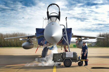 Air National Guard Senior Airman Jen Carter and Master Sgt. Matt Musmeci, 159th Aircraft Maintenance Squadron crew chiefs, handle liquid oxygen on an F-15C Eagle during exercise Frisian Flag at Leeuwarden Air Base, Netherlands. Frisian Flag is an exercise, similar to Red Flag, led by the Royal Netherlands Air Force. The 159th Fighter Wing is deployed to Europe as part of a Theater Security Package. 