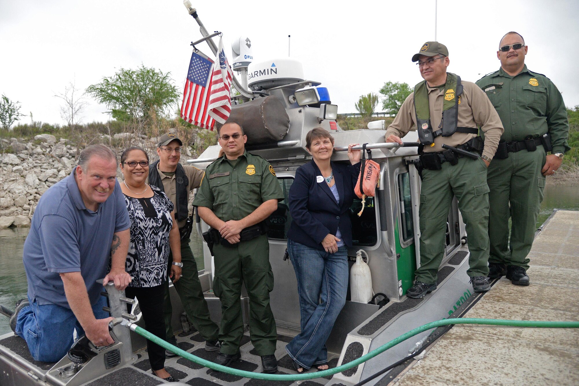 Members of the 47th Force Support Squadron and the Del Rio Customs and Border Patrol fuel a boat at the Southwinds Marina on Laughlin Air Force Base, Texas on April 14, 2017.  The marina restored fuel operations on the dock thanks to the P4 Initiative and partners in the Del Rio community. (U.S. Air Force Photo by Airman 1st Class Daniel Hambor)