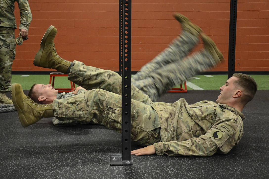 Army Sgt. Nicholas Shidlovsky and 2nd Lt. Gregory Gerlach work out at a gym in Frederickburg, Va., April 10, 2017, to prepare for the upcoming Best Sapper Competition at Fort Leonard Wood, Mo. Both are assigned to the Virginia Army National Guard’s 229th Brigade Engineer Battalion, 116th Infantry Brigade Combat Team. Army National Guard photo by Sgt. 1st Class Terra C. Gatti