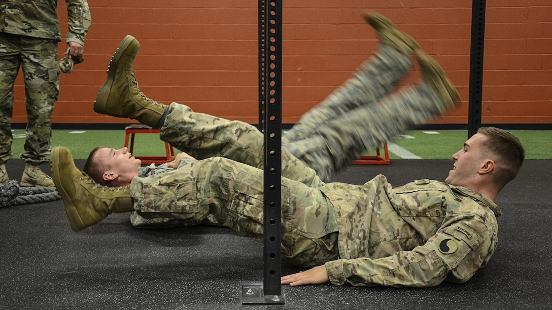 Army Sgt. Nicholas Shidlovsky and 2nd Lt. Gregory Gerlach work out at a gym in Frederickburg, Va., April 10, 2017, to prepare for the annual Best Sapper Competition at Fort Leonard Wood, Mo. Both are assigned to the Virginia Army National Guard’s 229th Brigade Engineer Battalion, 116th Infantry Brigade Combat Team. Army National Guard photo by Sgt. 1st Class Terra C. Gatti