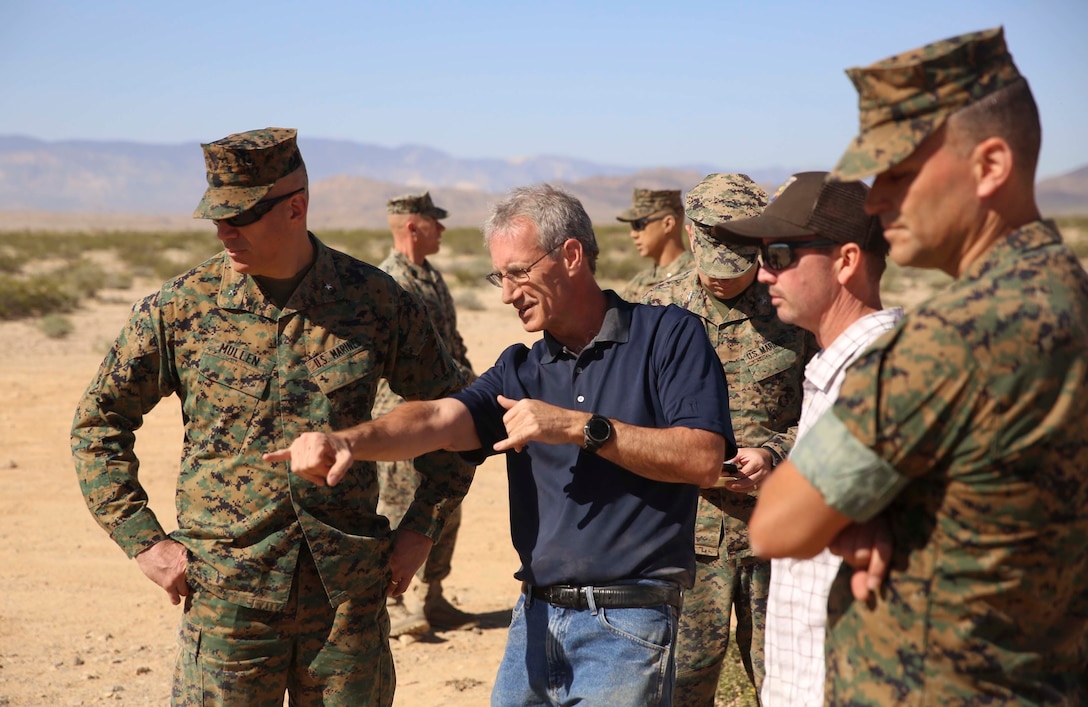 Combat Center Commanding General, Brig. Gen. William F. Mullen III, asks Dr. Brian Henen, base ecologist, Natural Resources and Environmental Affairs, questions about the Desert Tortoise translocation facilitated by the Marine Corps Air Ground Combat Center, Twentynine Palms, Calif., April 12, 2017. The translocation, in accordance with the U.S. Fish and Wildlife Service-signed Biological Opinion, serves as a negotiated mitigation to support a congressionally mandated land expansion which, will afford the Combat Center the ability to conduct Large Scale Exercise training of a Marine Expeditionary Brigade-level force. (U.S. Marine Corps photo by Cpl. Medina Ayala-Lo)