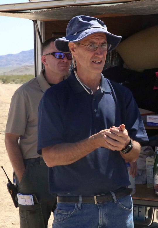 Dr. Brian Henen, base ecologist, Natural Resources and Environmental Affairs, answers media member’s questions during the Desert Tortoise translocation, April 12, 2017, which was facilitated by the Marine Corps Air Ground Combat Center, Twentynine Palms, Calif. The translocation, in accordance with the U.S. Fish and Wildlife Service-signed Biological Opinion, serves as a negotiated mitigation to support a congressionally mandated land expansion which, will afford the Combat Center the ability to conduct Large Scale Exercise training of a Marine Expeditionary Brigade-level force. (U.S. Marine Corps photo by Cpl. Medina Ayala-Lo)