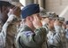 A 58th Fighter Squadron captain salutes while in formation during the 33rd Fighter Wing’s change of command ceremony at Eglin Air Force Base, Fla., April 13.  Col. Lance Pilch relinquished command of the training wing to Col. Paul Moga.  (U.S. Air Force photo/Samuel King Jr.)