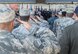 Outgoing and incoming leadership salute the flag during the national anthem at the 33rd Fighter Wing’s change of command ceremony at Eglin Air Force Base, Fla., April 13.  Col. Lance Pilch (middle) relinquished command of the training wing to Col. Paul Moga (right).  (U.S. Air Force photo/Samuel King Jr.)
