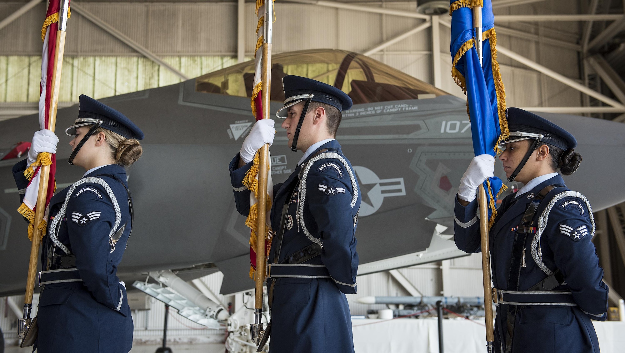 Jack Conklin and Team Eglin Honor Guard members stand ready to bring in the colors at the 33rd Fighter Wing’s change of command ceremony at Eglin Air Force Base, Fla., April 13.  Col. Lance Pilch relinquished command of the training wing to Col. Paul Moga.  (U.S. Air Force photo/Samuel King Jr.)