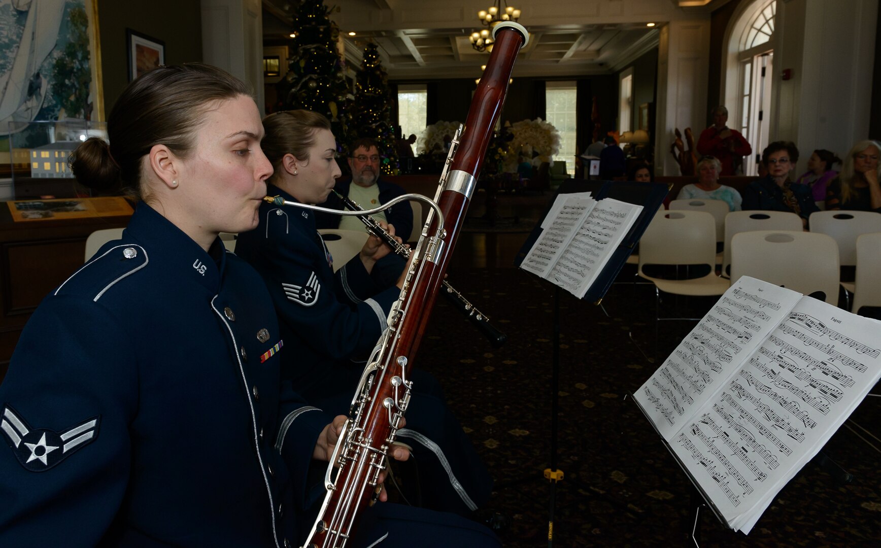 Airman 1st Class Laura McIntyer, Band of the West bassoonist, preforms for Gulf Coast residents and travelers at the Biloxi Visitor's Center Feb. 26, 2017 Biloxi, Miss. Members of the Spectrum Winds Quintet, an ensemble of the Band of the West, played a medley of concert and ceremonial marching music for the attendees. (U.S. Air Force photo by Andre' Askew)