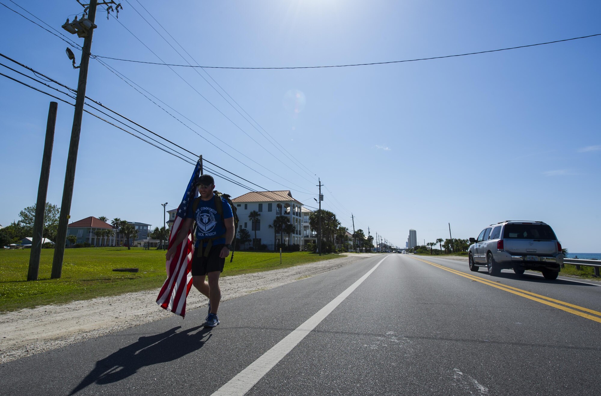Tech. Sgt. Doug Iredale, a special missions aviator with the 4th Special Operations Squadron, marches in the 6th Annual Air Commando Ruck March at Panama City Beach, Fla., April 13, 2017. The Air Commando Ruckers marched 450 miles from MacDill Air Force Base, to Hurlburt Field. (U.S. Air Force photo by Airman 1st Class Joseph Pick)