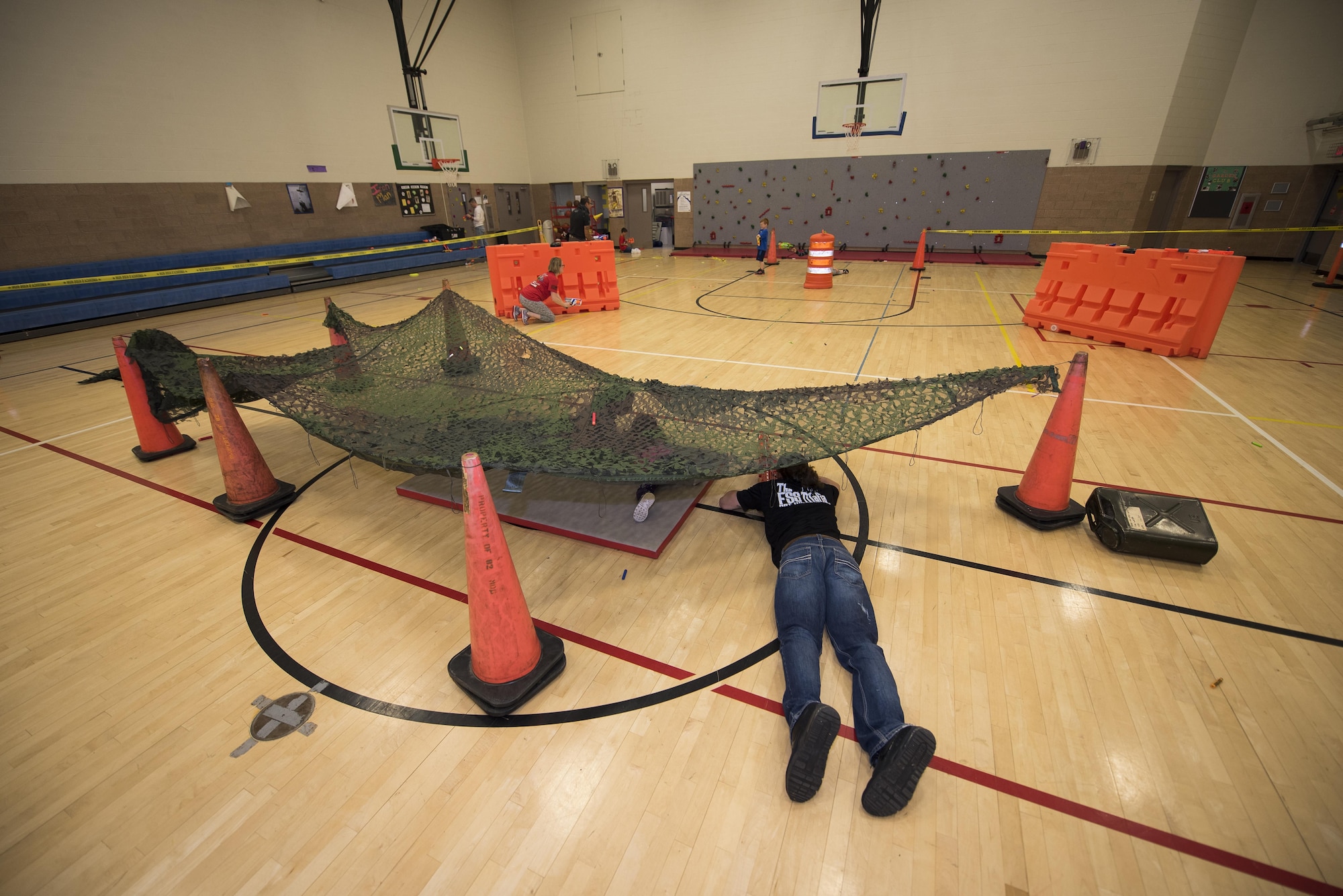 Families from Sheppard Air Force Base, Texas, participate in the Family Advocacy Nerf Night at the Madrigal Youth Center, April 13, 2017. The Nerf night was held to encourage families to unplug from electronic devices and spend time bonding as families. (U.S. Air Force photo by Staff Sgt. Kyle E. Gese)