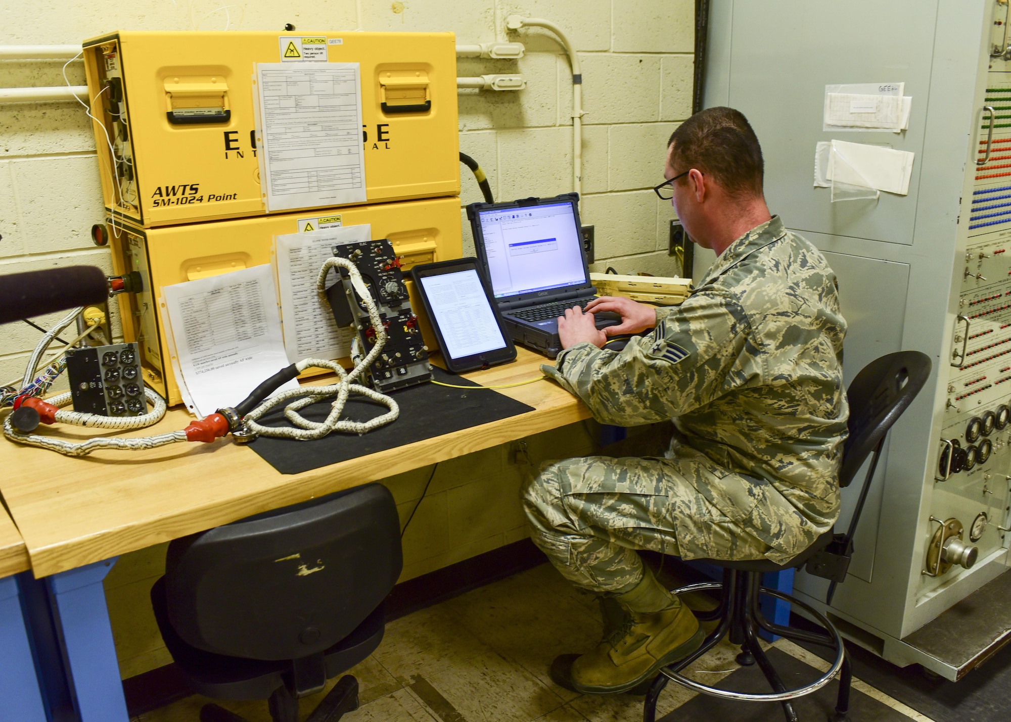 Senior Airman Mark Lee, an Electrical and Environmental craftsman assigned to the 28th Maintenance Squadron, troubleshoots an electrical component from a B-1 bomber using the state-of-the-art ECLYPSE tester inside the E&E back shop at Ellsworth Air Force Base, S.D., April 12, 2017. This state of the art tester has cut the troubleshooting process time for a part from 10 hours to 10 minutes. (U.S. Air Force photo by Airman 1st Class Randahl J. Jenson)