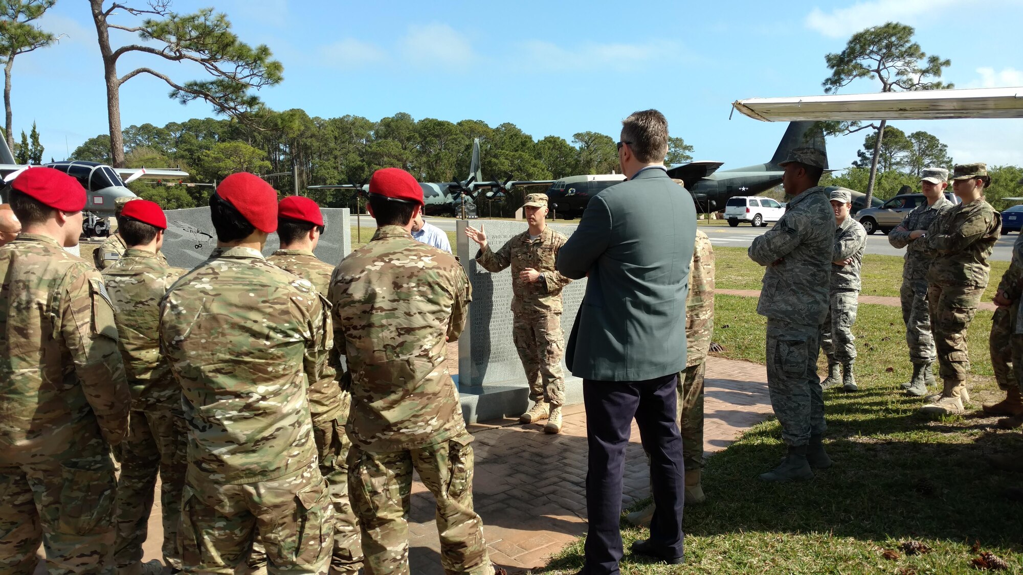 Lt. Col. Matthew Ziemann, the IW Department Chair for USAFSOS, leads an airpark tour at Hurlburt Field, Fla., March 28, 2017. The airpark tour was park of the Contemporary Irregular Warfare Course relating Air Force Special Operations Command aircraft to a lesson on airpower in irregular warfare. (Courtesy Photo)