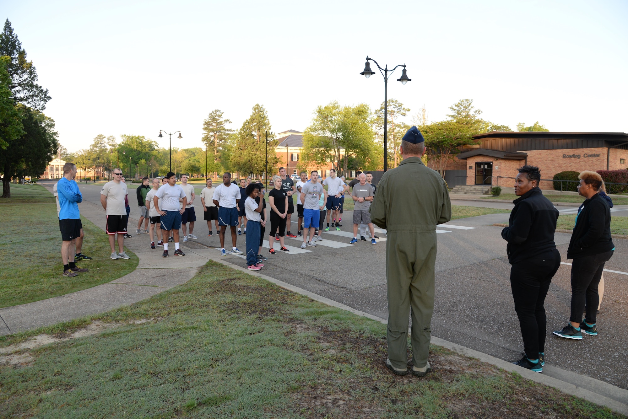 The Columbus Sexual Assault Prevention and Response Office and Col. James Fisher, 14th Flying Training Wing Vice Commander, go over the rules of the SAPR 5k Run For Recovery and wish the participants good luck April 13, 2017, Columbus Air Force Base, Mississippi. For every obstacle that a participant conquered, a ticket was rewarded to them for a final prize at the end of the run. (U.S. Air Force photo by Airman 1st Class Beaux Hebert)