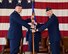 Col. Stan Lawrie, 14th Operations Group Commander, passes the 14th Operations Support Squadron guidon to Lt. Col. James Winning, the new 14th OSS Commander during a change of command ceremony April 13, 2017, at the McAllister Fire Station on Columbus Air Force Base, Mississippi. Winning was previously the Director of Operations for the 14th Student Squadron on Columbus AFB, Mississippi. (U.S. Air Force photo by Elizabeth Owens)