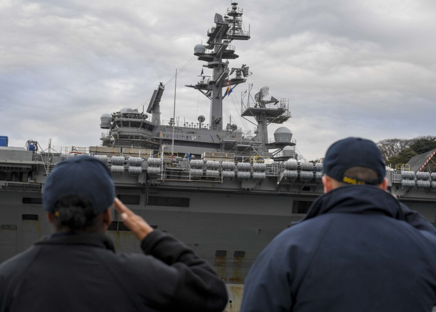 File photo of USS Stethem -- Sailors assigned to the Arleigh Burke-class guided-missile destroyer USS Stethem (DDG 63) salute the Nimitz-class aircraft carrier USS Ronald Reagan (CVN 76) as Stethem departs from Commander, Fleet Activities Yokosuka, Feb. 24, 2017. Stethem is forward deployed to the U.S. 7th Fleet area of operations supporting security and stability in the Indo-Asia-Pacific region. 