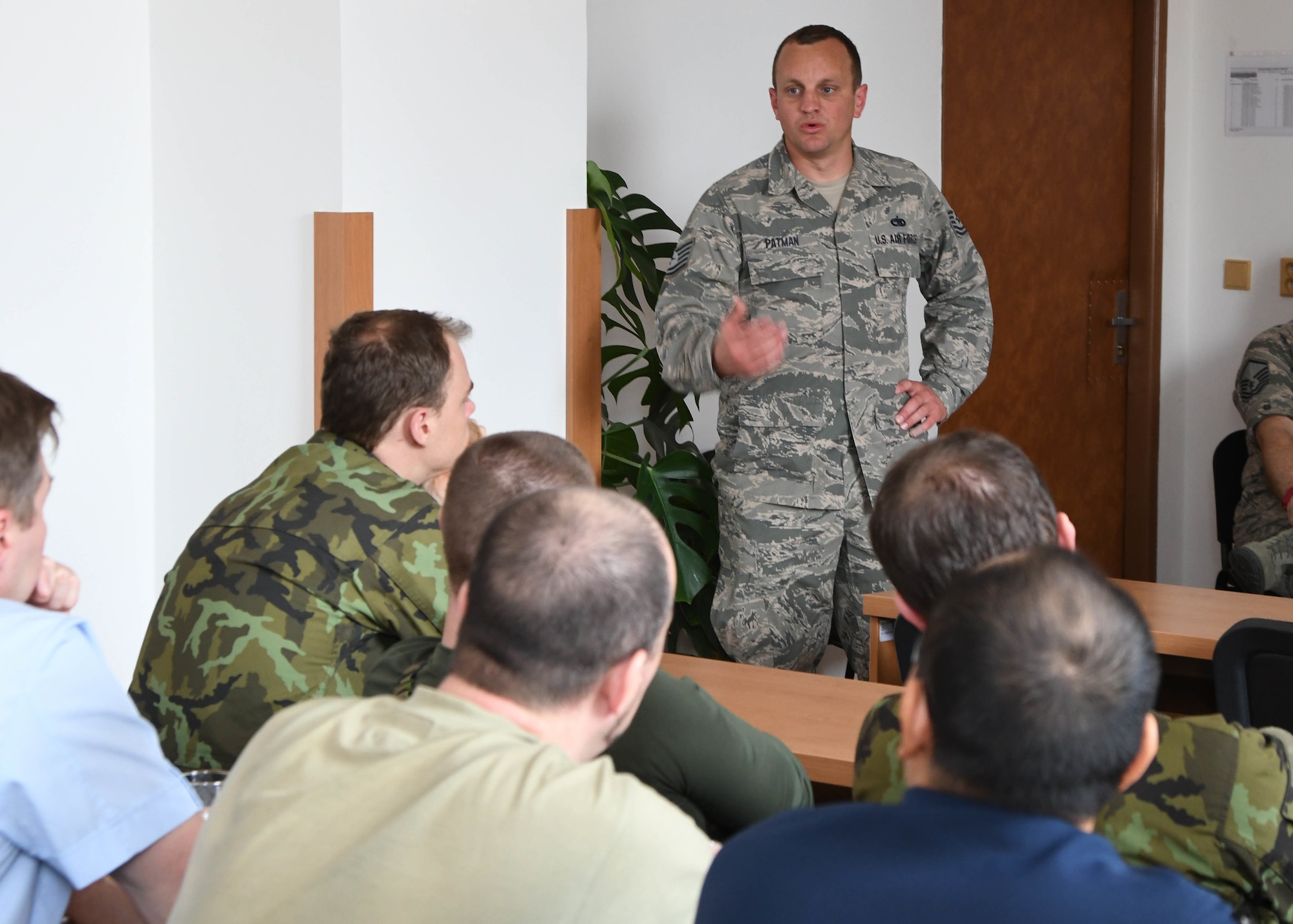 U.S. Air Force Tech Sgt. Jarrett Patman, a crew chief with the 136th Aircraft Maintenance Squadron, Texas Air National Guard, gives a briefing to a class of Czech Airmen about the 136th Airlift Wing, March 21, 2017, at the 21st Tactical Air Base, Caslav, Czech Republic. Patman represented the 136th as a subject matter expert for his career field. (Air National Guard photo by Senior Airman De’Jon Williams)