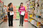 Aracelis Gonzalez-Anderson (left), Health Promotions Program coordinator, and Claudia Smith, Commissary store manager, discuss the available healthy food options April 11, 2017, at Joint Base San Antonio-Randolph Commissary. The Health Promotions Services offer resources on eating healthy and promote living a fit lifestyle to JBSA personnel.