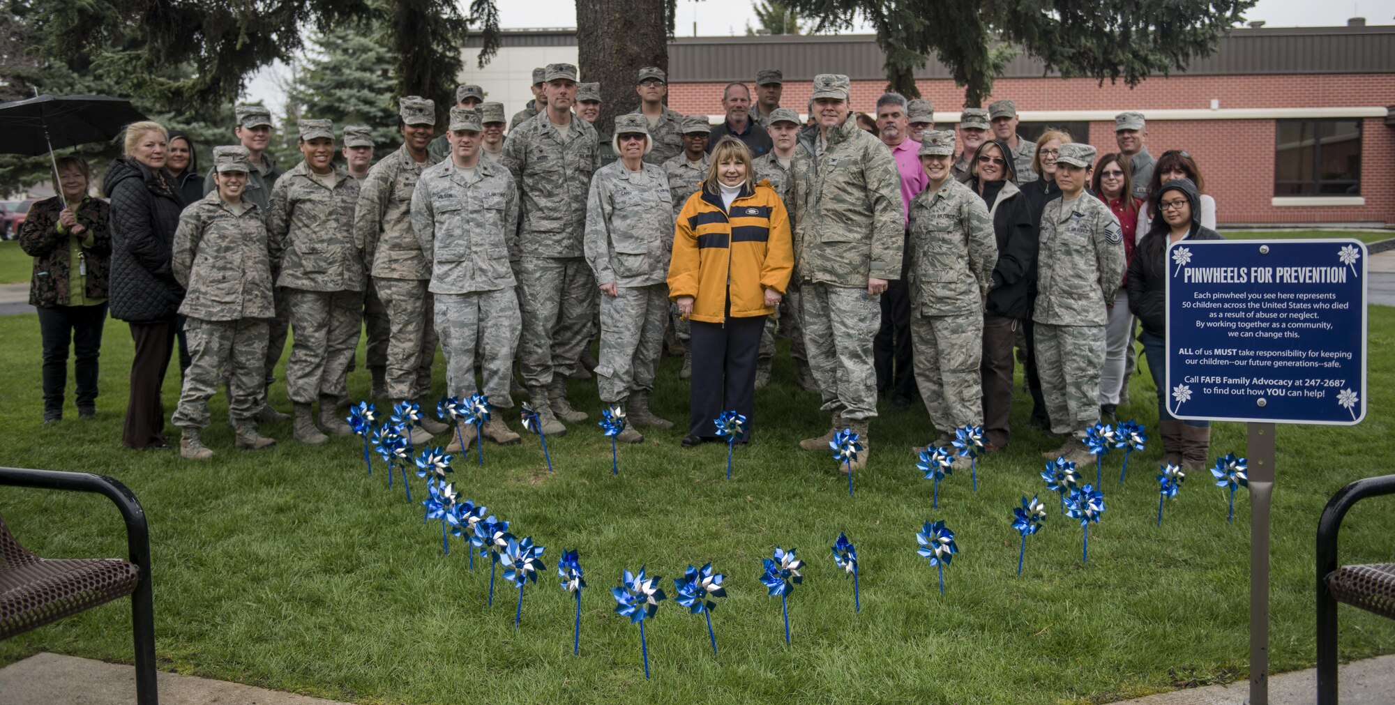 Members of Team Fairchild gathered during the Pinwheels for Prevention event to raise awareness for Child Abuse Awareness Month Apr. 12, 2017, at Fairchild Air Force Base, Washington. For more than 30 years, America has acknowledged April as Child Abuse Awareness Month. Sweeping legislation throughout the 70s and 80s gave rise to the needed public awareness campaign. Despite these efforts, in 2014, the Center for Disease Control estimated over 1,500 children died from abuse and neglect in the United States. (U.S. Air Force photo/Airman 1st Class Sean Campbell) 