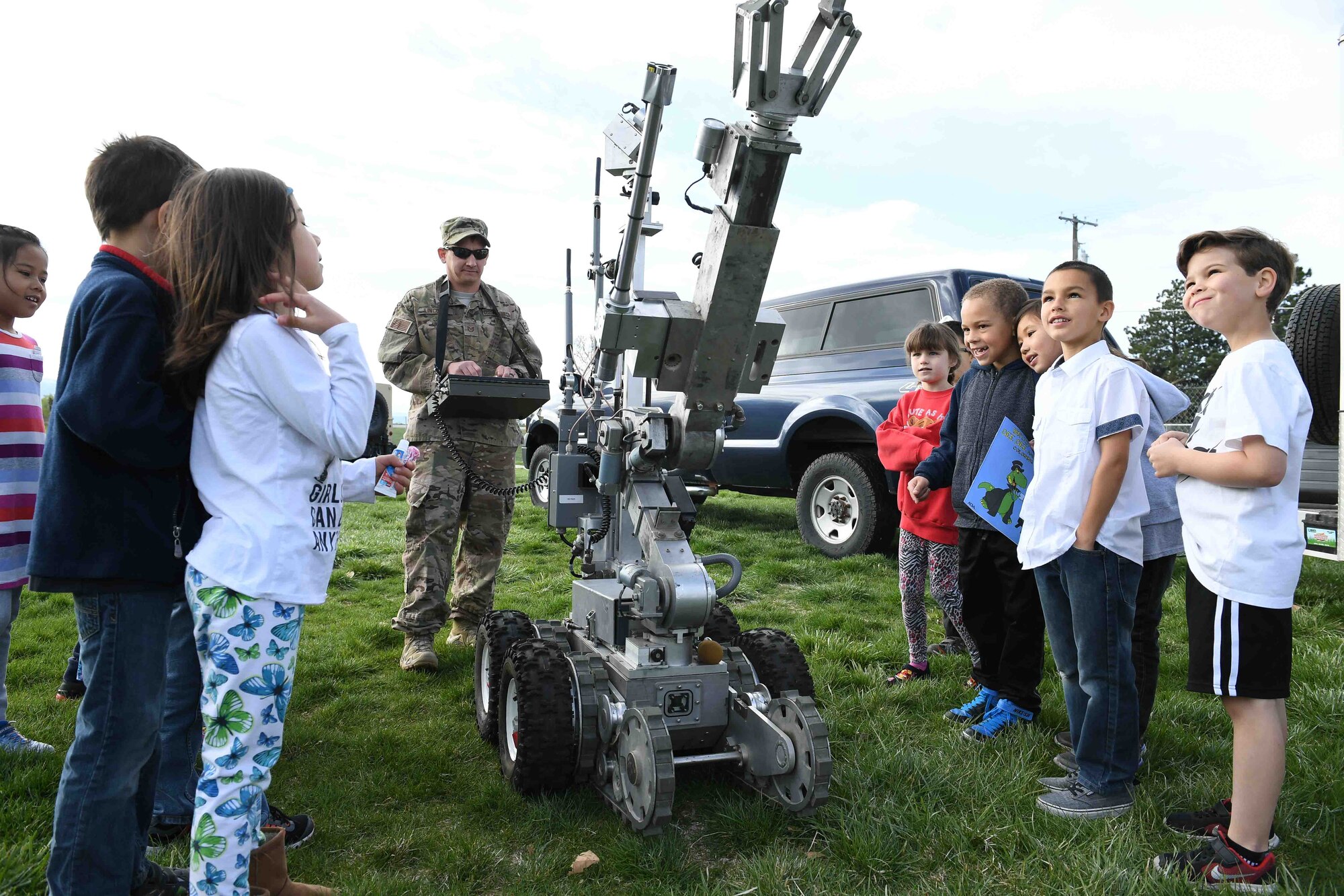 Tech. Sgt. Timothy Lincoln operates an explosive ordnance disposal robot during the Kids Deployment Day event, Hill Field Elementary, Utah, April 12, 2017. (U.S. Air Force photo/R. Nial Bradshaw)
