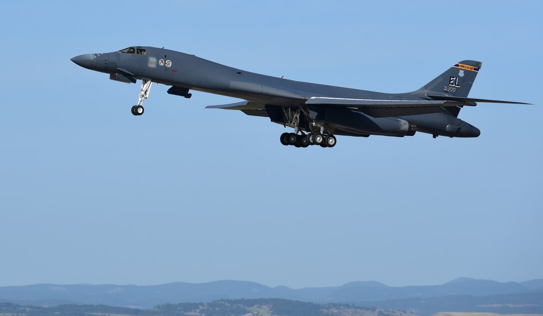 An Ellsworth B-1 with a new piece of nose art with historic ties takes off down a runway at Ellsworth Air Force Base, S.D., April 14, 2017. The Ruptured Duck nose art is the same design from a B-25 Mitchell bomber that was flown during the Doolittle Raid in 1942. (U.S. Air Force photo by Senior Airman James L. Miller)