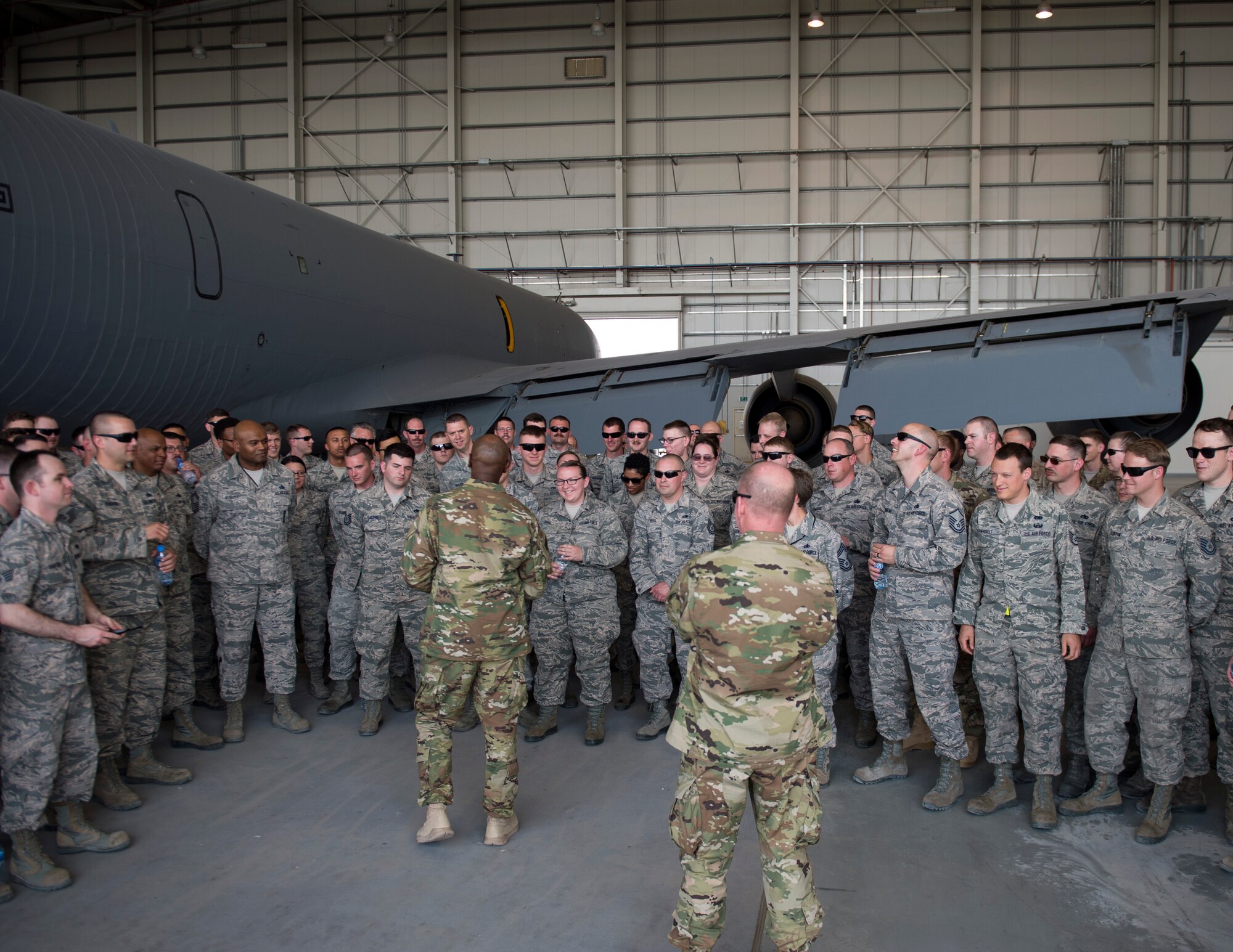 U.S. Air Force Vice Chief of Staff Gen. Stephen W. Wilson and Chief Master Sgt. of the Air Force Kaleth O. Wright visit Airmen with the 379th Expeditionary Maintenance Group at Al Udeid Air Base, Qatar, April 12, 2017. Throughout their visit, Wilson and Wright made stops to units across the wing, providing an opportunity for the Airmen to speak about their duties and ask questions they had. (U.S. Air Force photo by Tech. Sgt. Amy M. Lovgren)
