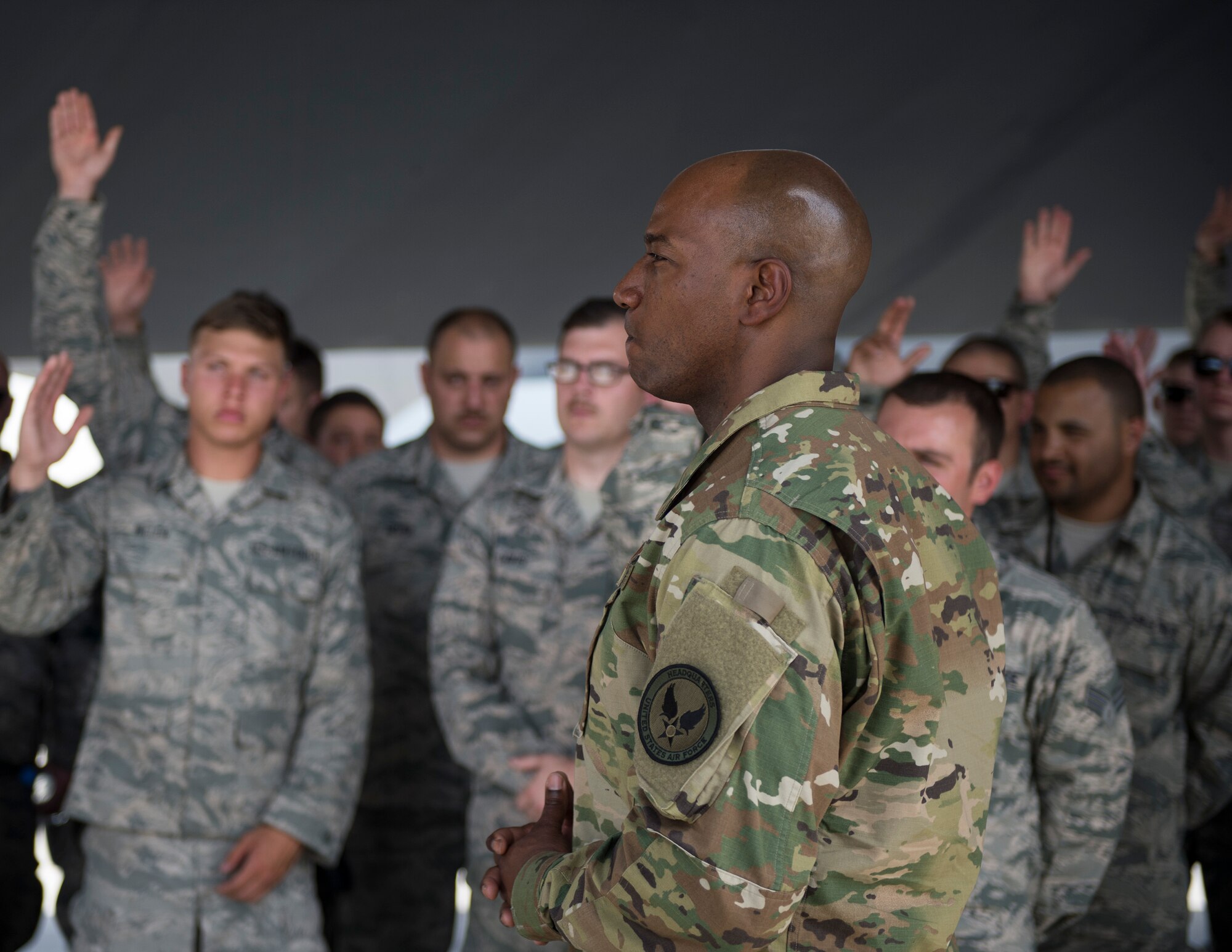 Chief Master Sgt. of the Air Force Kaleth O. Wright takes questions from maintainers and munitions Airmen from the 379th Expeditionary Maintenance Group at Al Udeid Air Base, Qatar, April 12, 2017. Wright was accompanied by U.S. Air Force Vice Chief of Staff Gen. Stephen W. Wilson and made several stops to units across the wing, providing an opportunity for Airmen to speak about their duties and ask questions they had. (U.S. Air Force photo by Tech. Sgt. Amy M. Lovgren)