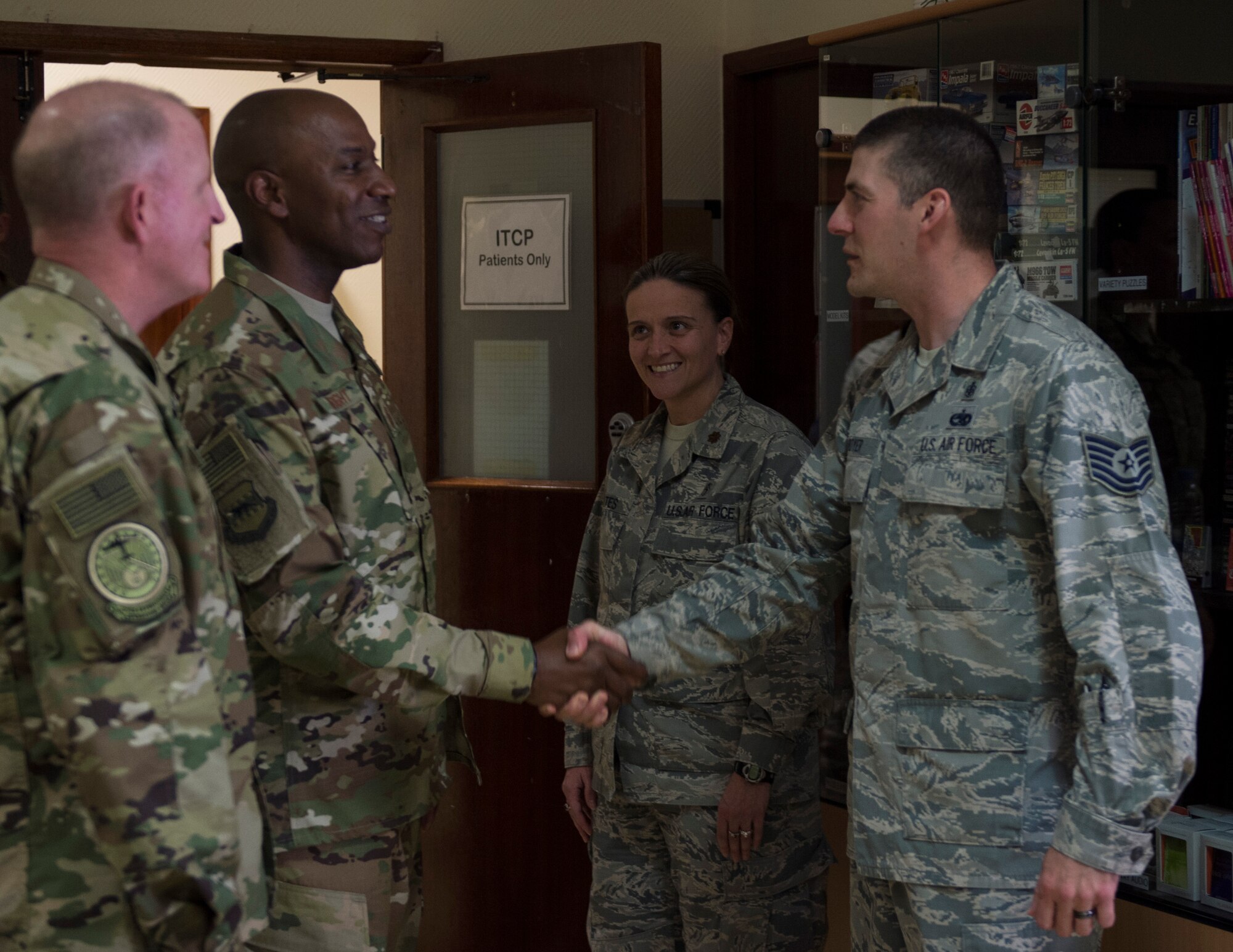 U.S. Air Force Vice Chief of Staff Gen. Stephen W. Wilson and Chief Master Sgt. of the Air Force Kaleth O. Wright visit Airmen with the 379th Expeditionary Medical Group at Al Udeid Air Base, Qatar, April 12, 2017. Throughout their visit, Wilson and Wright made stops to units across the wing, providing an opportunity for the Airmen to speak about their duties and ask questions they had. (U.S. Air Force photo by Tech. Sgt. Amy M. Lovgren)