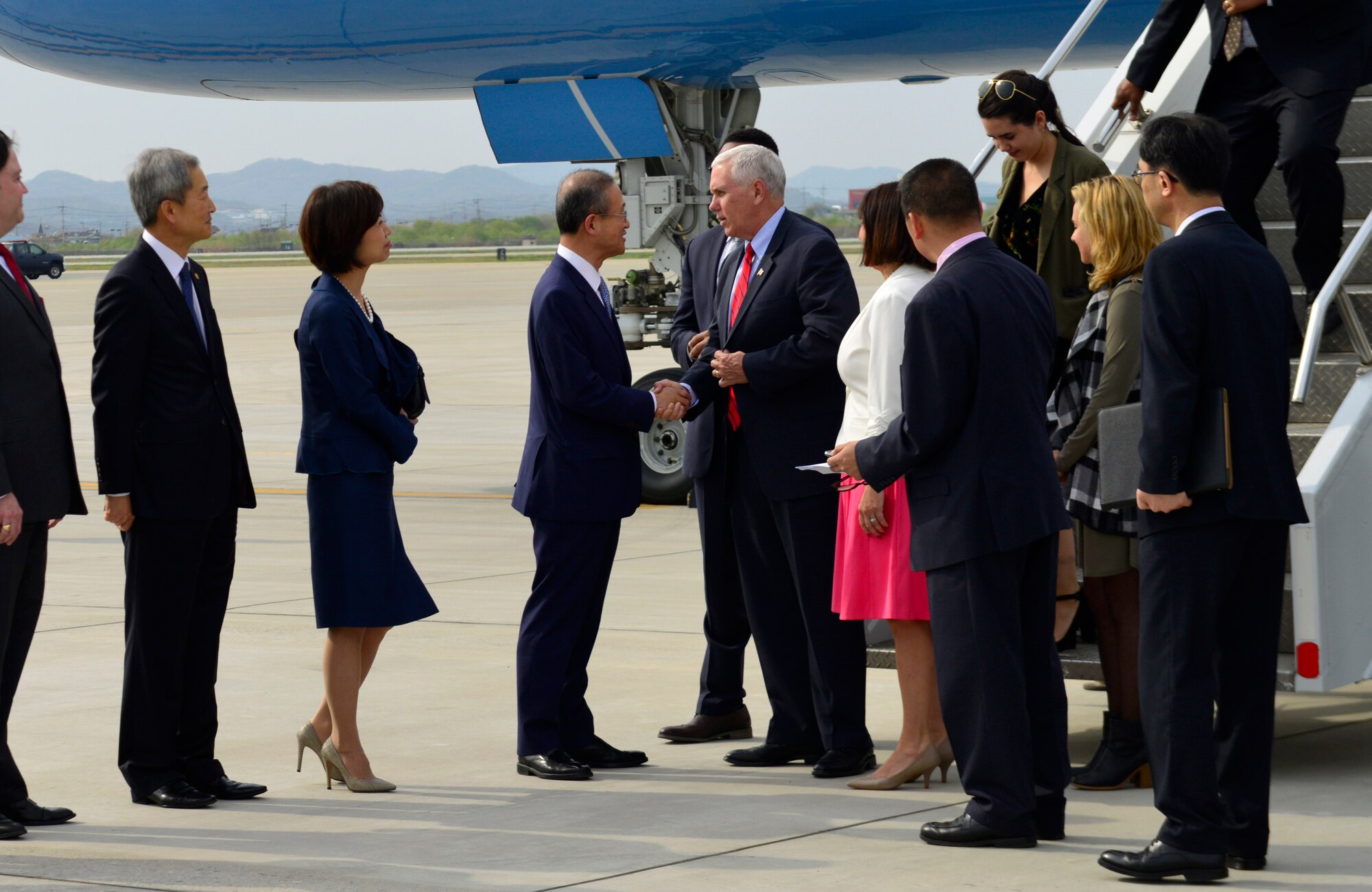 U.S. Vice President of the United States Mike R. Pence and his wife, Karen Pence, greet Republic of Korea Vice Foreign Minister Lim, Sung-Nam at Osan Air Base, Republic of Korea, April 16, 2017. The visit, which marked the most senior member of the Trump administration to visit Korea, underscored how the long alliance between the U.S. and the ROK is a linchpin of peace and prosperity in the Asia-Indo-Pacific region and the commitment the U.S. government has to support its regional allies. (U.S. Air Force photo by Alex Fox Echols III)