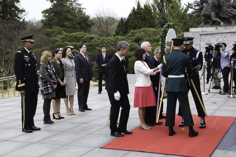 Vice President Mike Pence and his wife, Karen, place a wreath at the Seoul National Cemetery in South Korea, April 16, 2017, during his first trip to Asia as vice president. Army photo by Sgt. 1st Class Sean K. Harp
