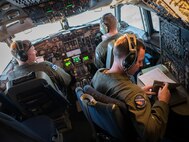 U.S. Air Force aircrew from the 961st Airborne Air Control Squadron operate an E-3 Sentry aircraft March 28, 2017, while flying during a training exercise over the Pacific Ocean. The 961st AACS is a combat-ready E-3 Sentry squadron providing airborne command and control, long-range surveillance, detection and identification information for commanders in support of U.S. goals. (U.S. Air Force photo by Senior Airman John Linzmeier/released)