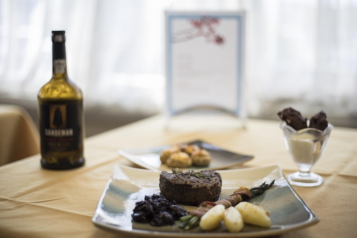 A meal prepared by U.S. Marine Corps Cpl. Rebecca Messex, a food service specialist with Headquarters and Headquarters Squadron, sits on a table during a Food Service Specialist of the Quarter competition at Marine Corps Air Station Iwakuni, Japan, April 13, 2017. Messex placed first in the competition and was selected for an opportunity to compete in the Marine Corps Installations Pacific Food Service Specialist of the Quarter Board to be held on April 19, 2017, in Okinawa. (U.S. Marine Corps photo by Lance Cpl. Joseph Abrego)