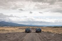 Airmen with the 374th Logistics Readiness Squadron and 36th Airlift Squadron complete setup an drop zone at Combined Armed Training Center Camp Fuji, Japan, April 12, 2017. Airmen from the 374th LRS and Eagle airlifts with the 36th AS conducted mass containerized delivery system airdrop training. (U.S. Air Force photo by Yasuo Osakabe)