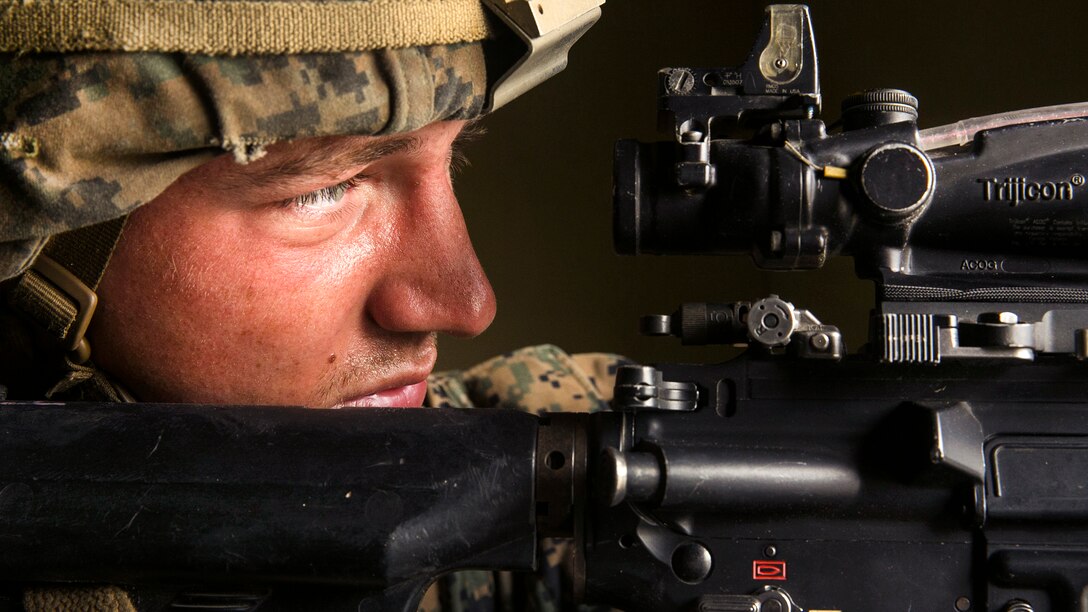 A Marine scans his sector of fire during amphibious assault integration training at Marine Corps Base Camp Pendleton, Calif., April 13, 2017. Marine Corps photo by Cpl. Frank Cordoba