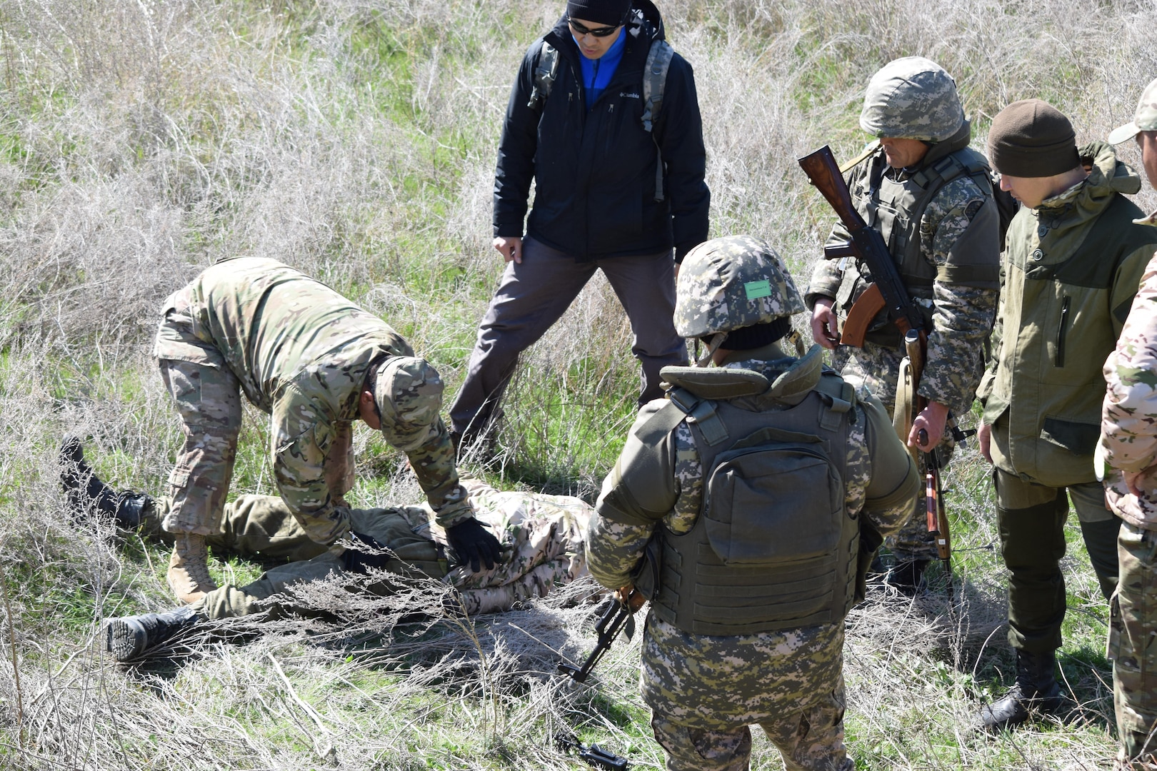 Sgt. 1st Class Javier Martinez, 6th Squadron, 9th Cavalry Regiment, U.S. Army, demonstrates how to search an enemy soldier wounded in action Apr. 9, 2017, during the practical exercise scenarios for Steppe Eagle Koktem at Illisky Training Center, Kazakhstan.
