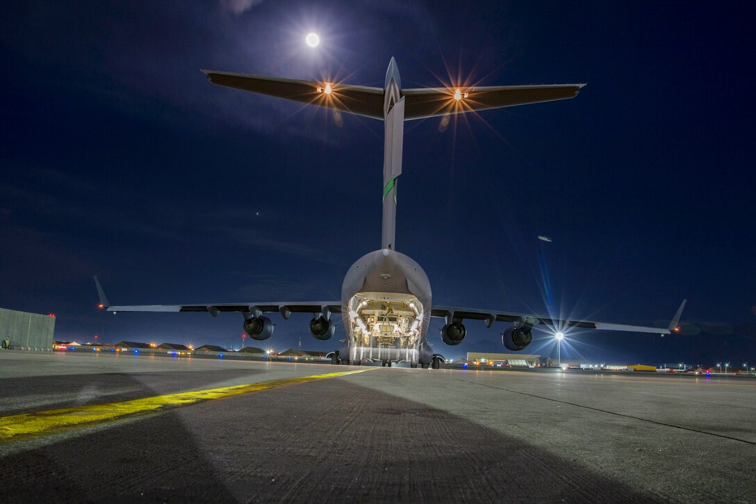 Soldiers and mine-resistant, ambush-protected vehicles wait inside a C-17 Globemaster III before takeoff at Bagram Airfield, Afghanistan, April 9, 2017. Army photo by Sgt. 1st Class Eliodoro Molina