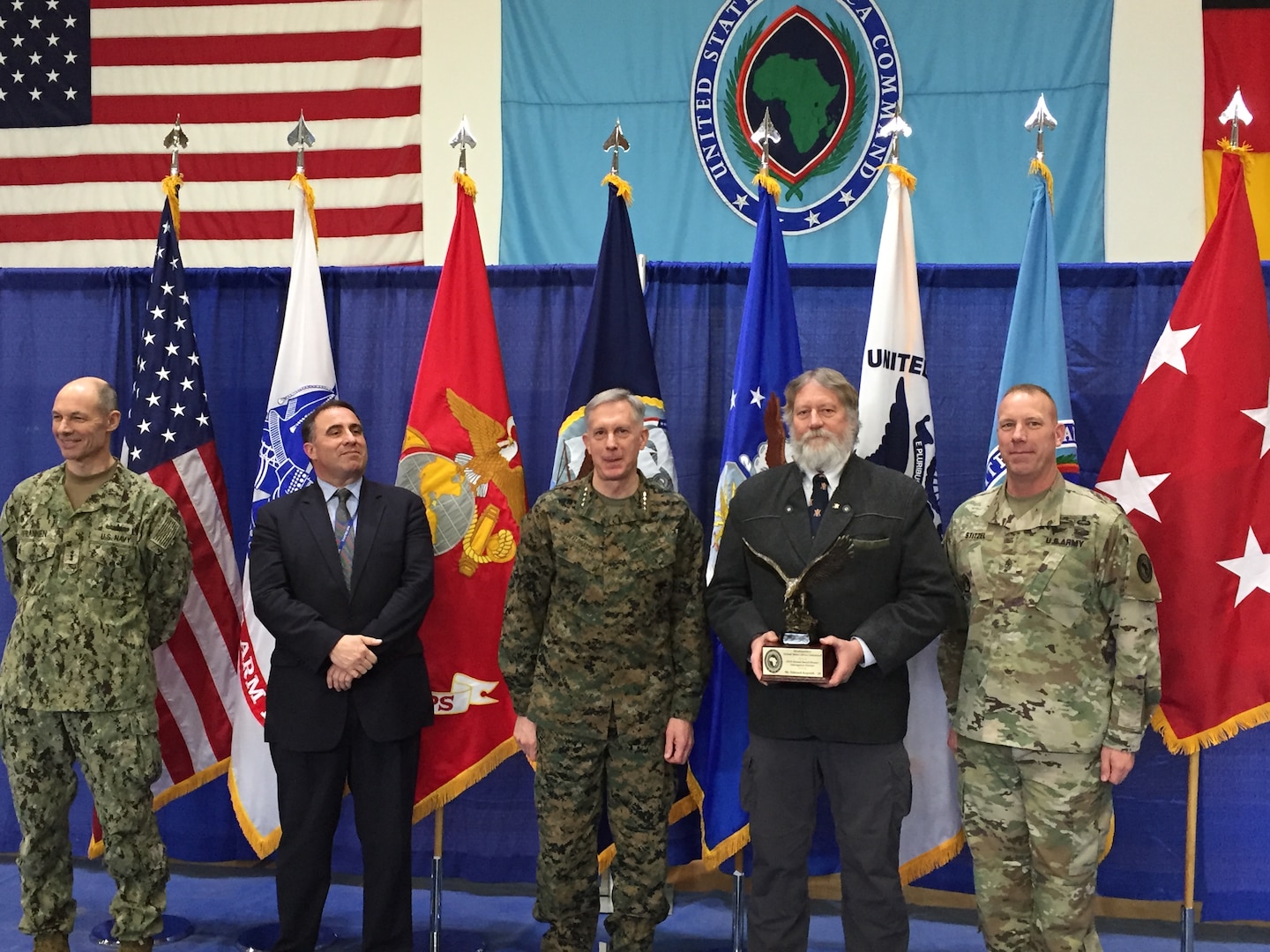Edward Kopsick, logistics management specialist with Defense Logistics Agency Distribution, receives the United States Africa Command Interagency Partner of the Year award for his work in supporting distribution operations in the area of responsibility.