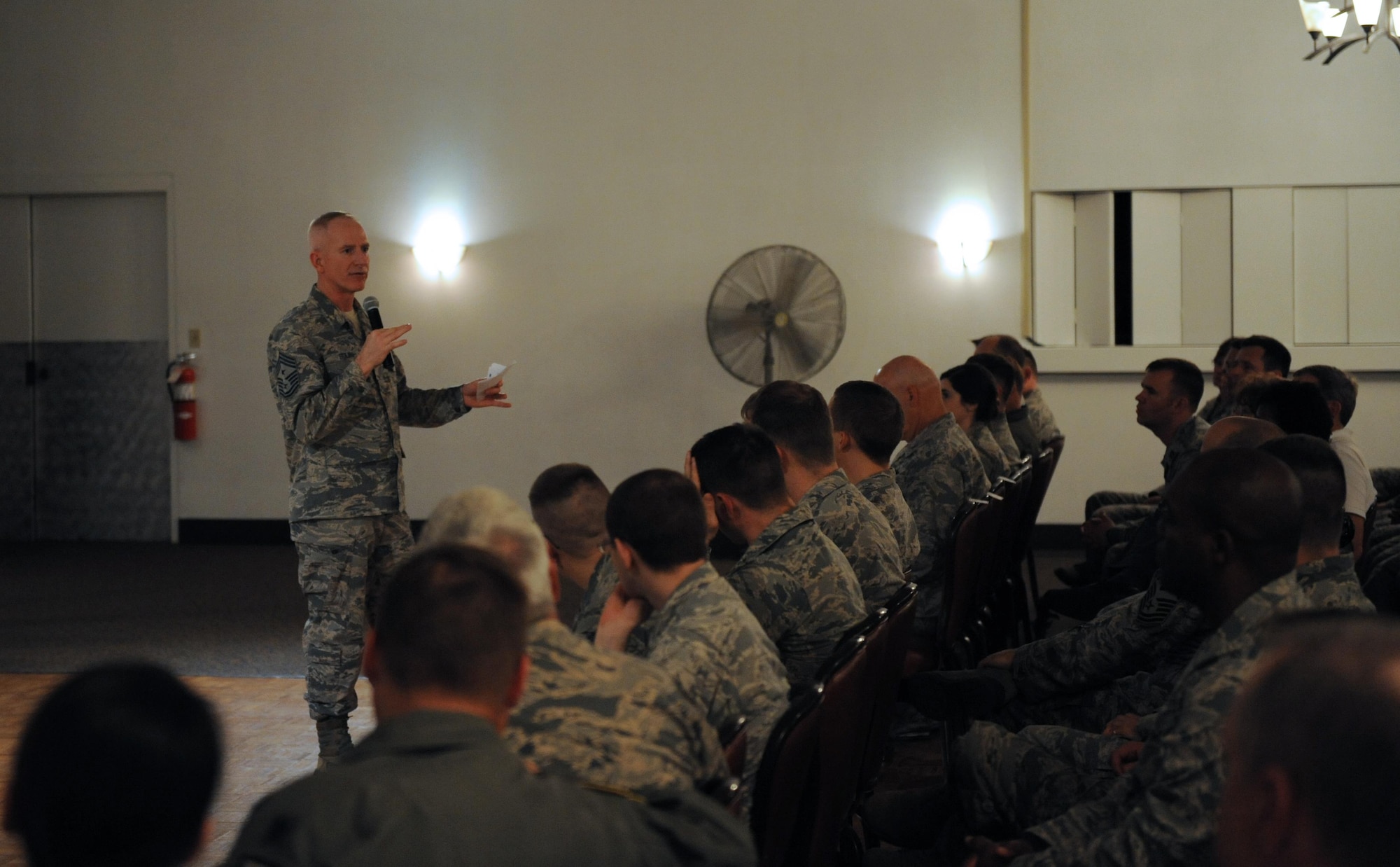 Chief Master Sgt. Alan Boling, Eighth Air Force command chief, speaks with Headquarters Eighth Air Force Airmen during a commander’s call at Barksdale Air Force Base, La., April 12, 2017. Commander’s calls foster face-to-face communication between leadership and Airmen, and are used to discuss topics of importance throughout the organization. (U.S. Air Force photo by Senior Airman Erin Trower)
