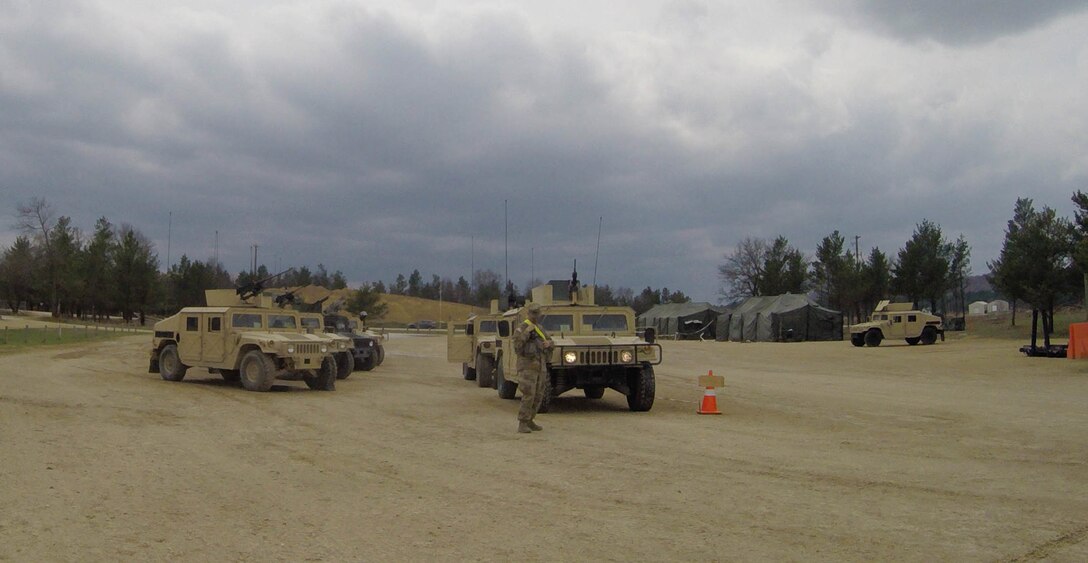 U.S. Army Reserve vehicles and their crews wait their turn for basic live-fire next to completed vehicles during Operation Cold Steel at Fort McCoy, Wis., April 15, 2017. Operation Cold Steel is the U.S. Army Reserve's crew-served weapons qualification and validation exercise to ensure that America's Army Reserve units and Soldiers are trained and ready to deploy on short-notice and bring combat-ready and lethal firepower in support of the Army and our joint partners anywhere in the world. (U.S. Army Reserve photo by Staff Sgt. Debralee Best, 84th Training Command)